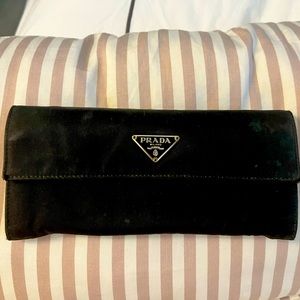 Authentic Black Prada Wallet with many compartments for cards and change